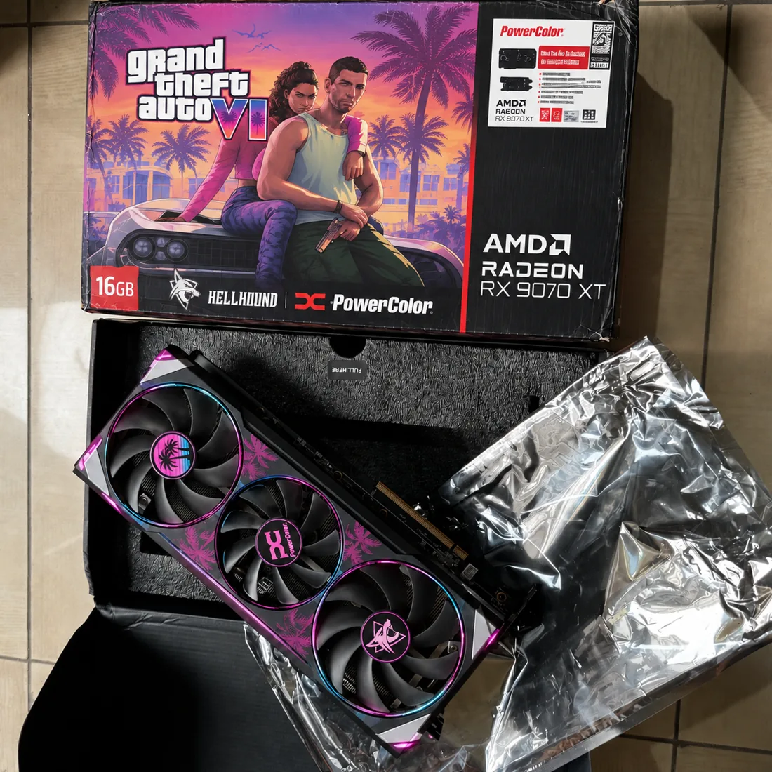 Concept: a Hellhound GTA VI edition unboxed, the card in its tray under the open box